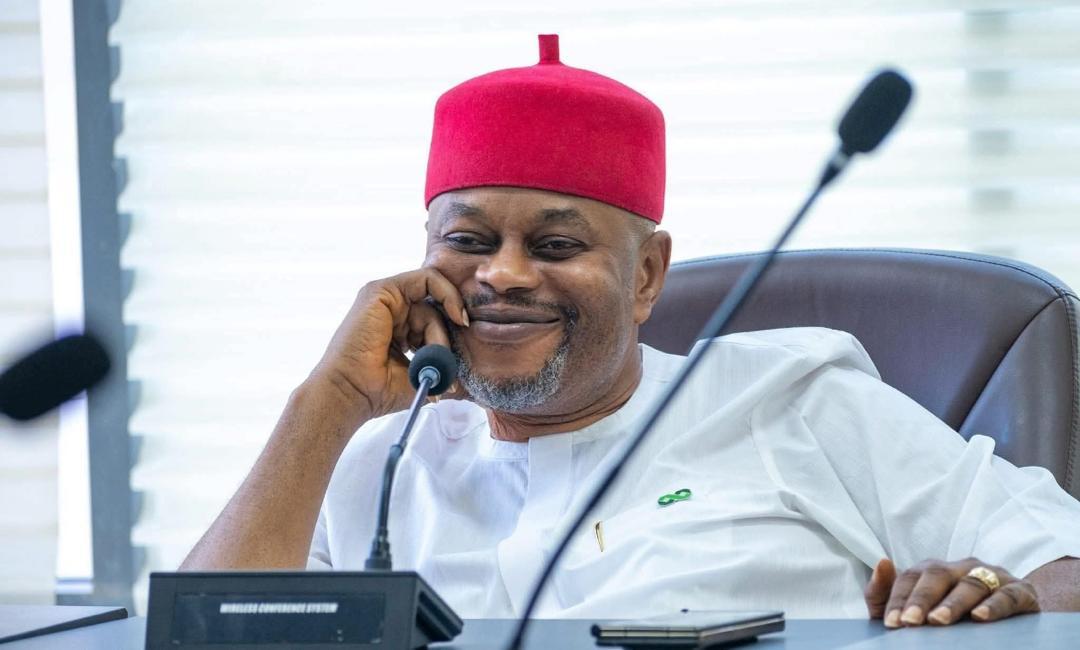 Chief Uche Nnaji seated at a meeting